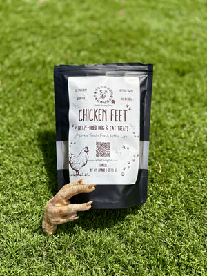 Bag of chicken feet treats for dogs on a grassy background